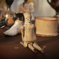 ancient greek doll from Thebes